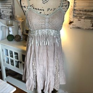Tan slip dress. Pretty lace embellishments. Small